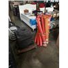 Image 1 : LOT OF 42" PILONS AND HEAVY RUBBER BASES WITH 4 WHEEL DOLLY