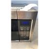 Image 2 : Whirlpool 1.1 cu. ft. Over the Range Microwave in Stainless Steel Retail $549 working