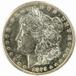 1892-CC Morgan Silver Dollar. AU-58 Cleaned (Uncertified).