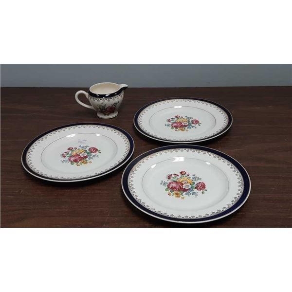 Four pieces of antique Washington pottery made in Hanley England three nine inch plates and creamer