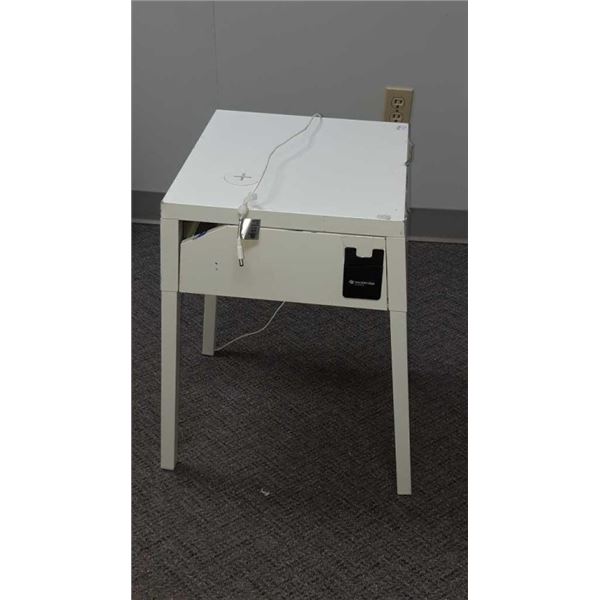 Small metal Ikea table with drawer not sure if it has a charging station or not maybe 14.5 inch by 1