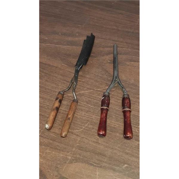 Pair of antique hair implements crimper and curling iron both have wooden handles