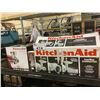 Image 1 : KITCHENAID STAND MIXER ATTACHMENT KIT, GRAIN MILL ATTACHMENT, & GLASS WINE CORK