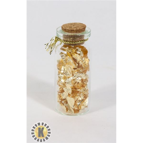 GLASS BOTTLE FILLED WITH GOLD FOIL