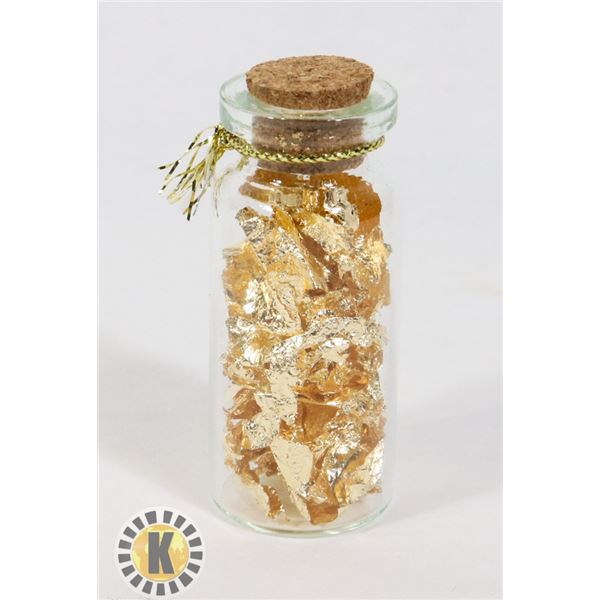 GLASS BOTTLE FILLED WITH GOLD FOIL