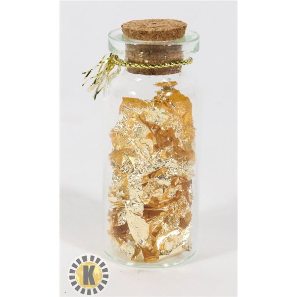 GLASS BOTTLE FILLED WITH GOLD FOIL