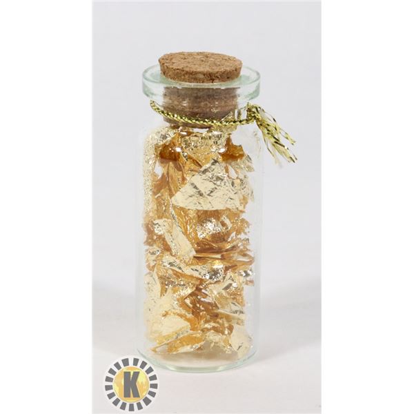 GLASS BOTTLE FILLED WITH GOLD FOIL