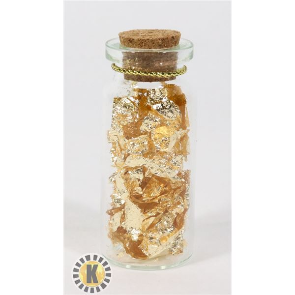 GLASS BOTTLE FILLED WITH GOLD FOIL