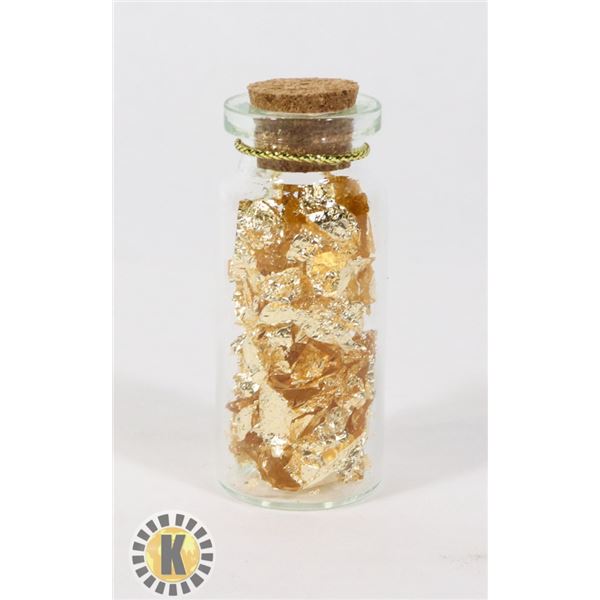 GLASS BOTTLE FILLED WITH GOLD FOIL