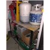 Image 1 : Approx. 4'x2' metal shelving unit & contents - 2 propane tanks/gasoline jerry cans/yard sprinklers/e