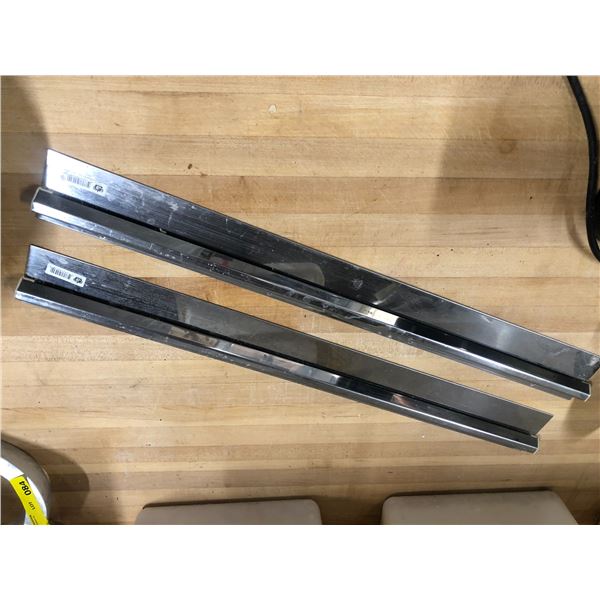 Two wall mount order holder bars approx. 2 1/2' long