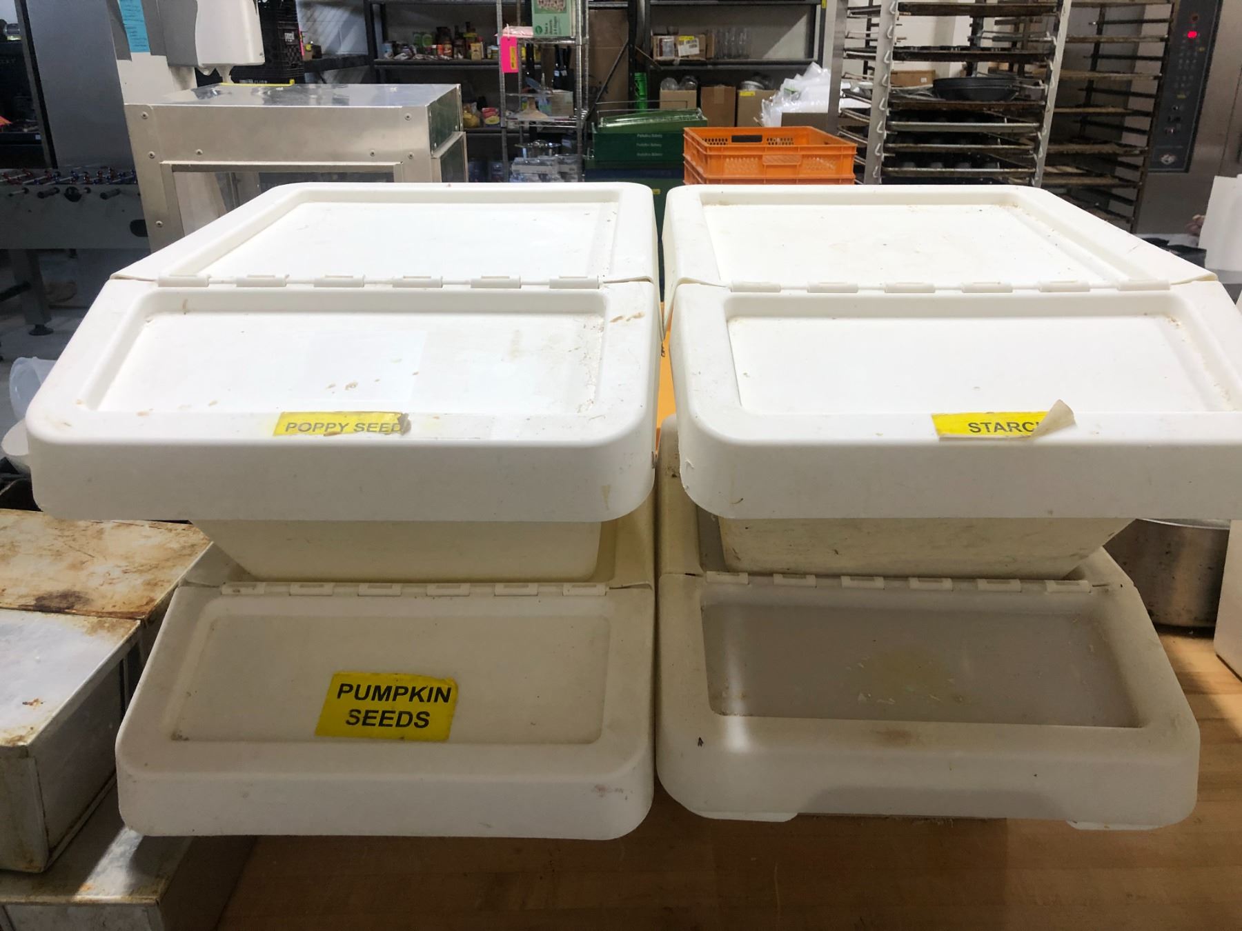 Group of 4 white plastic stackable dry ingredient storage bins