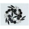 Image 1 : 2'' BLACK AND WHITE MULTI-STONE COSTUME BROOCH