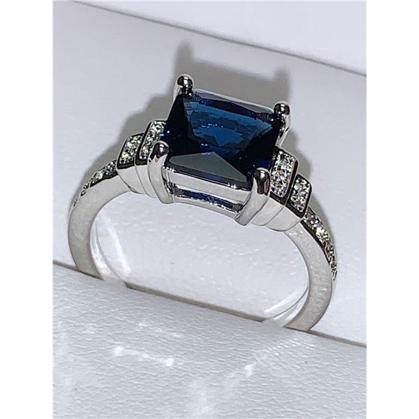 Ladies .90 Carat Princess cut Topaz Solitaire with side stones Dress ring size 7