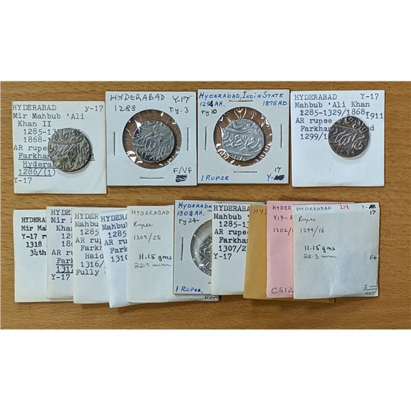 HYDERABAD: LOT of 14 hammered silver rupees