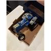 Image 2 : VINTAGE METAL FORD TRACTOR TOY AND TRAILER