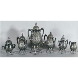 VICTORIAN REPOUSSE PLATED TEA SET, 8 pieces,