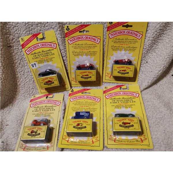 Six matchbox sealed cars