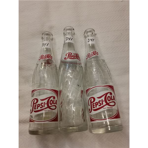 3 vintage Pepsi bottles