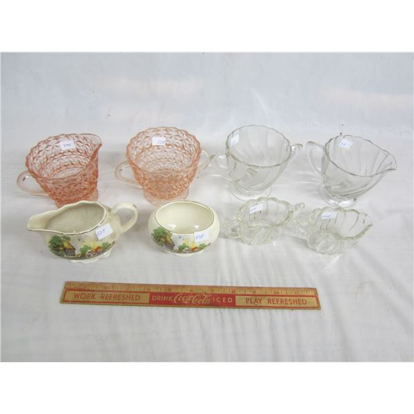 4 Sets of Creams and Sugars