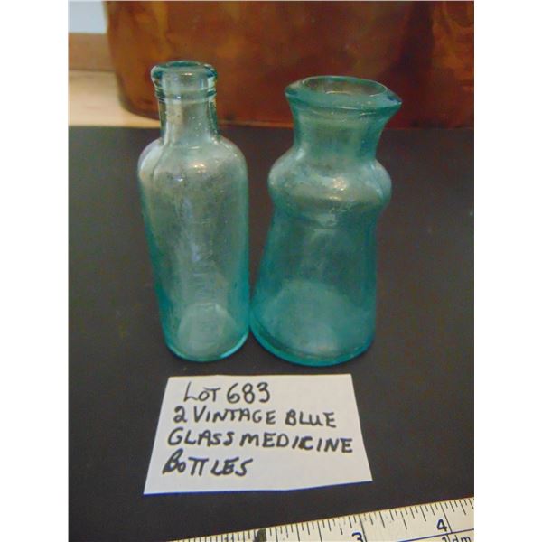 683 TWO ANTIQUE BLUE GLASS MEDICINE BOTTLES
