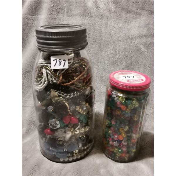 Two jars of jewelry, beads etc.
