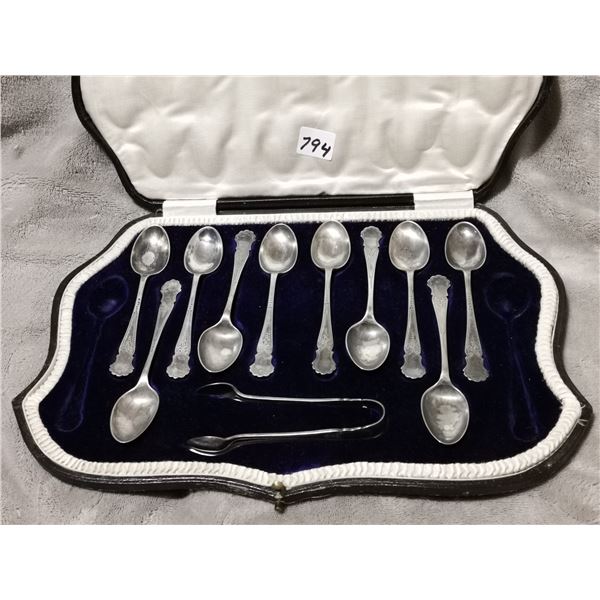 Antique silverware set in case