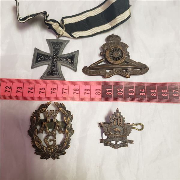 four Militaria military / RCMP / her Majasty  style badges medals
