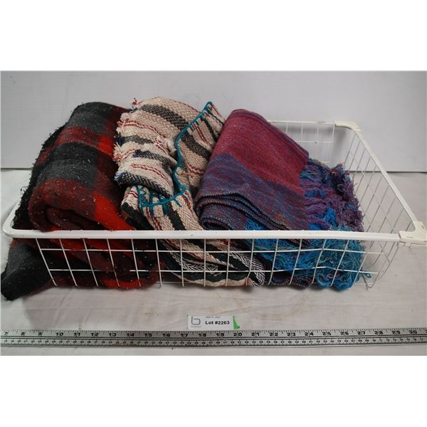 Wire basket with 3 blankets