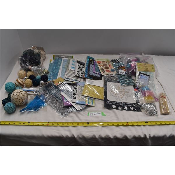 Crafting supplies, rhinestones, yarn, etc