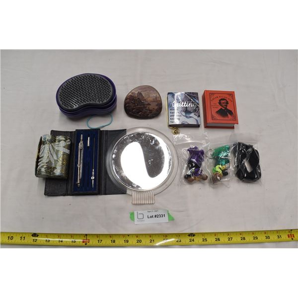 Mirror, pocket books, painted rock, misc. items