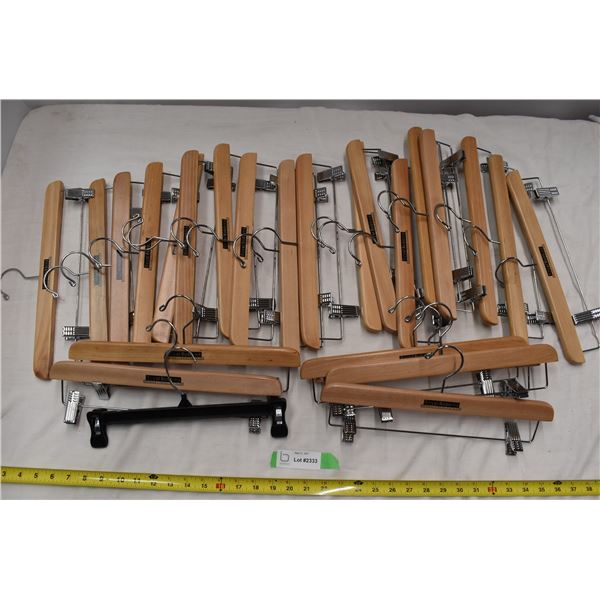 Box of wooden clothes hangers