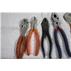 Image 2 : crescent wrenches + pliers + wire cutters