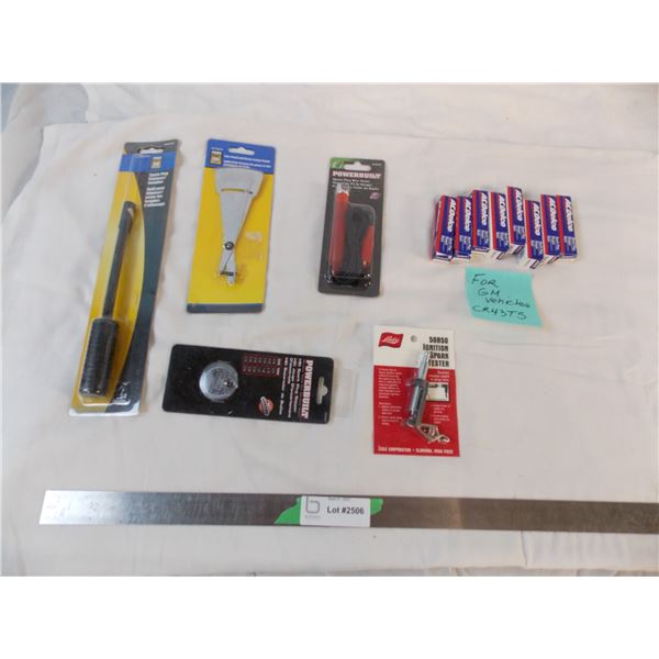 8 spark plugs, tire tread + spark plug gauges, spark plug tool