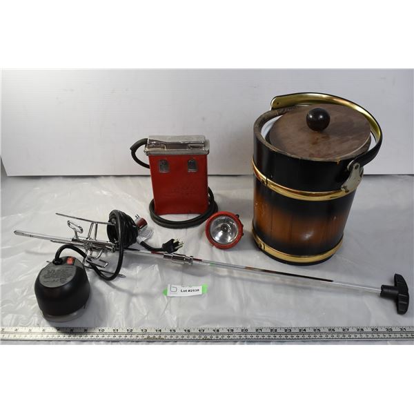 Coal miner light, rottisserie, wooden icebox.