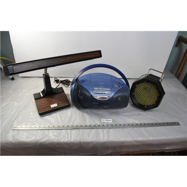 Sony stereo, yamaha portable speaker, vintage wooden desk light