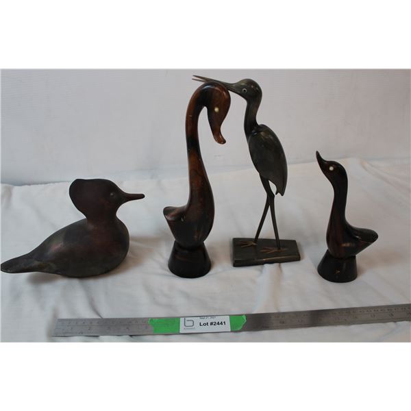 Wooden duck carvings, iron wood heron carving and  duck ornament