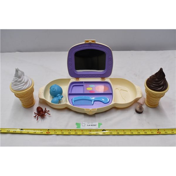 Fisher price dress up, plastic ice cream combs, ET stamp