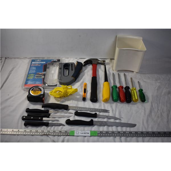 Screwdrivers, staplegun, measuring tape, kitchen knives