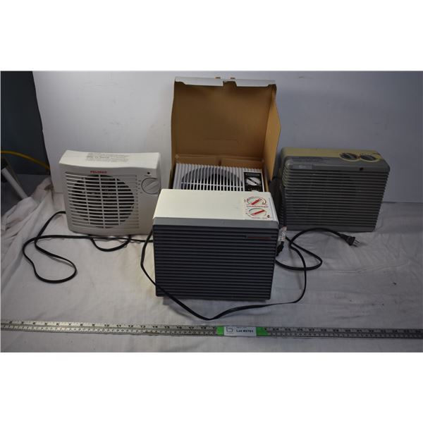 box of 4 electric heaters - all power on/fans work, one appears new unused