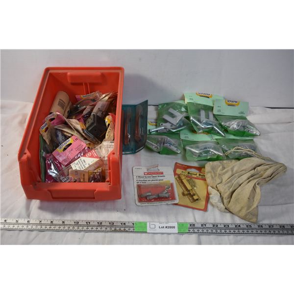 Storage container with misc household repair - gate latches, screws, cabinet handles