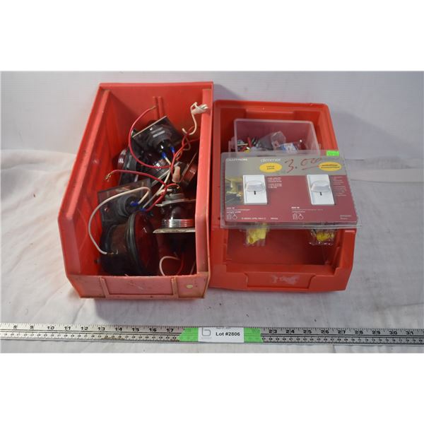 2 storage containers with lightswitches + red lights