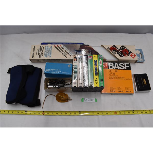 Misc. items including glide n guard & VHS tapes