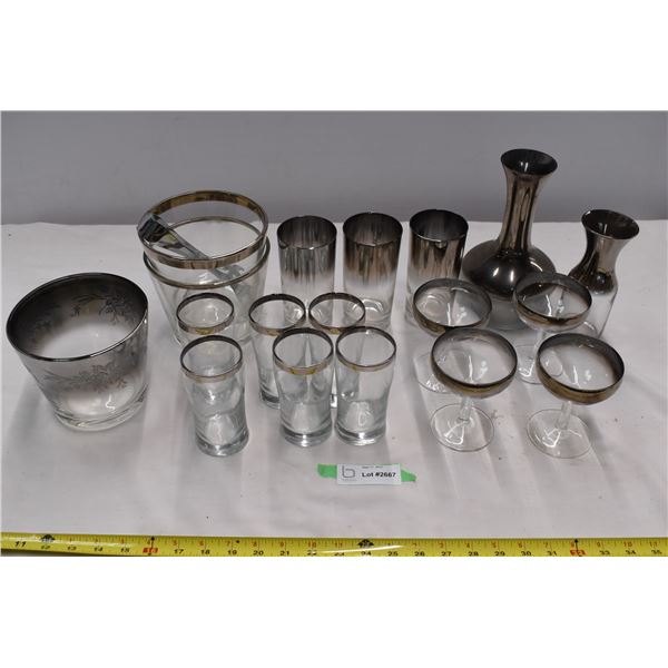 Assorted silver/black rimmed glassware