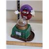 Image 1 : M&M novelty candy dispenser.