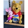 Image 1 : Winnie the Pooh & Piglet alarm clock, piggy bank. Plays theme song.