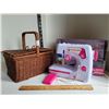 Image 1 : Beginner Singer sewing machine & wicker storage basket.