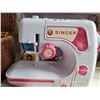 Image 3 : Beginner Singer sewing machine & wicker storage basket.