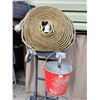 Image 1 : Vintage GSW Fire pail & 2” fire hose with couplers.