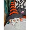 Image 9 : Halloween lot. Door hanger, plaster skull, hooded skeleton, crashing witch & orange hair hat.